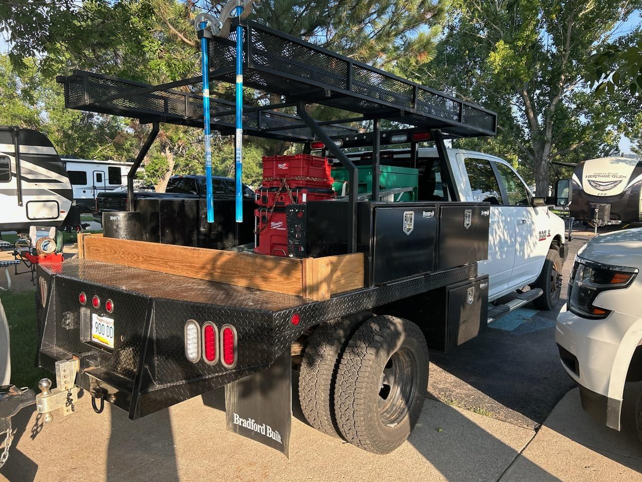 custom ladder rack on flatbed truck front view